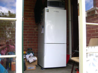 Fridge etc. exiled to the porch Fridge etc. exiled to the porch
